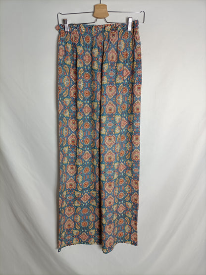 OTHERS. Flowing blue trousers with TU(S) print