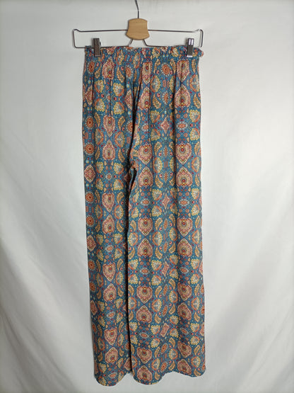 OTHERS. Flowing blue trousers with TU(S) print