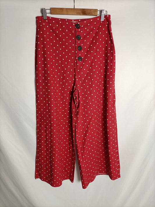 STRADIVARIUS. Burgundy polka dot trousers, size 42