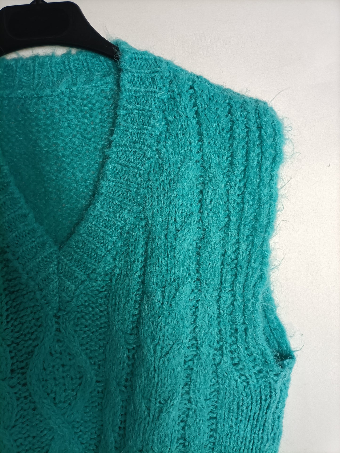 OTRAS. Chaleco turquesa ochos T.1(S)