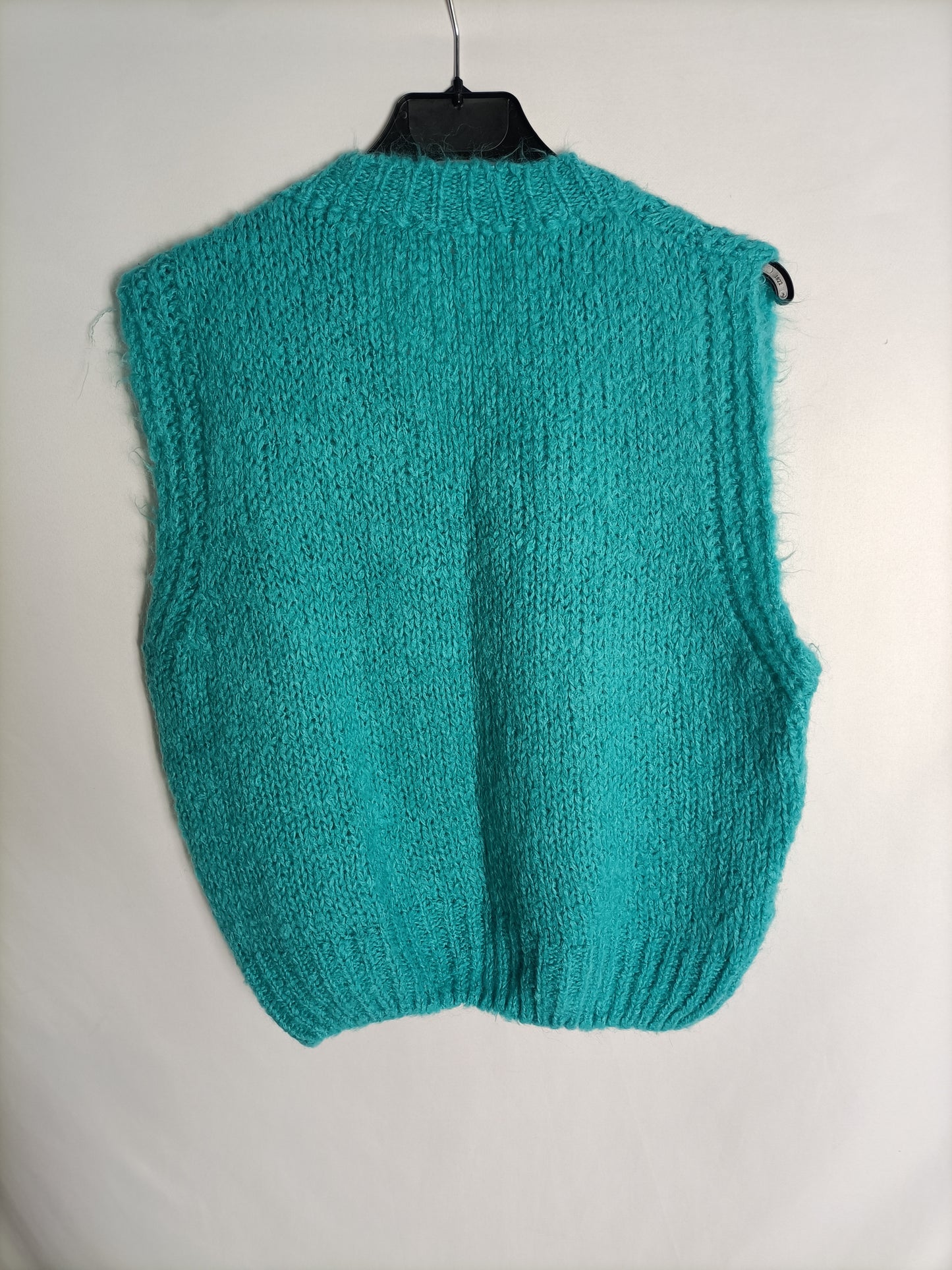 OTRAS. Chaleco turquesa ochos T.1(S)