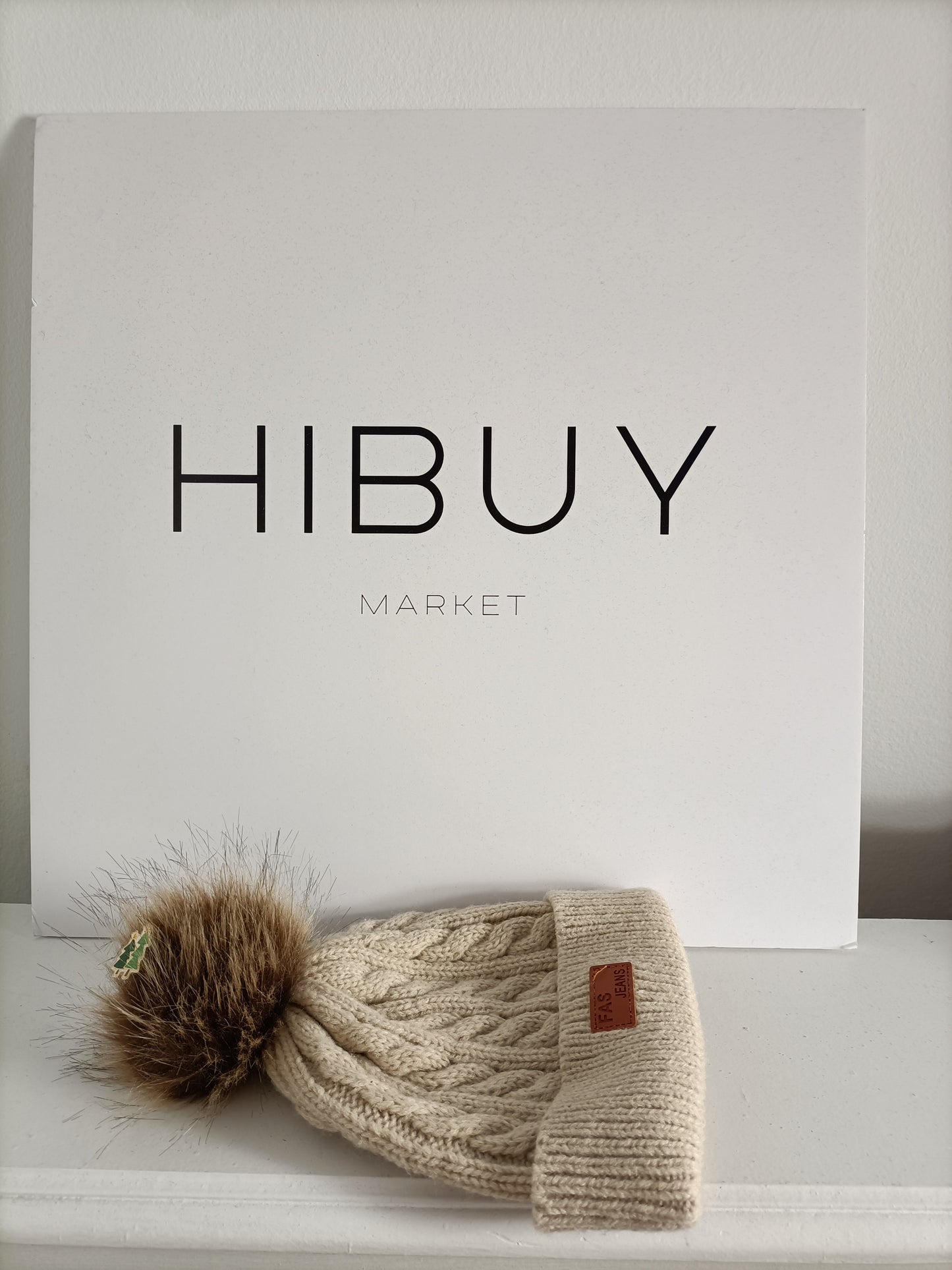 FAS JEANS. Beige pompom hat