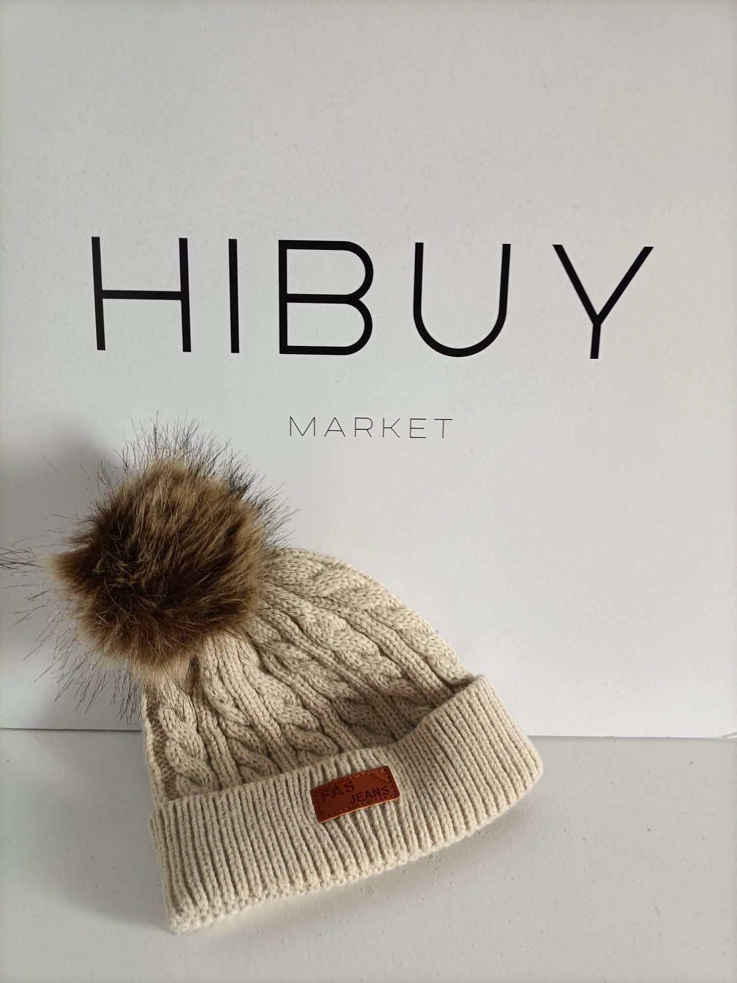 FAS JEANS. Beige pompom hat