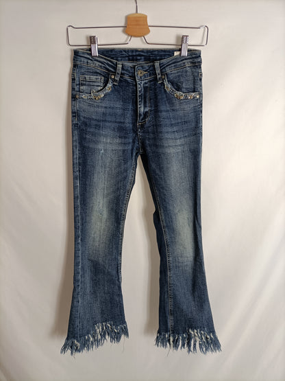 OTRAS. Pantalón denim deshilachado T.s