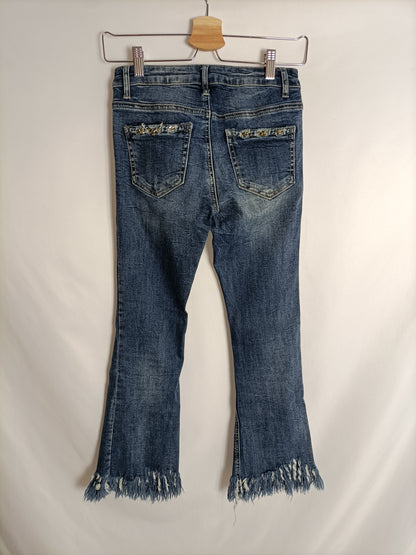 OTRAS. Pantalón denim deshilachado T.s