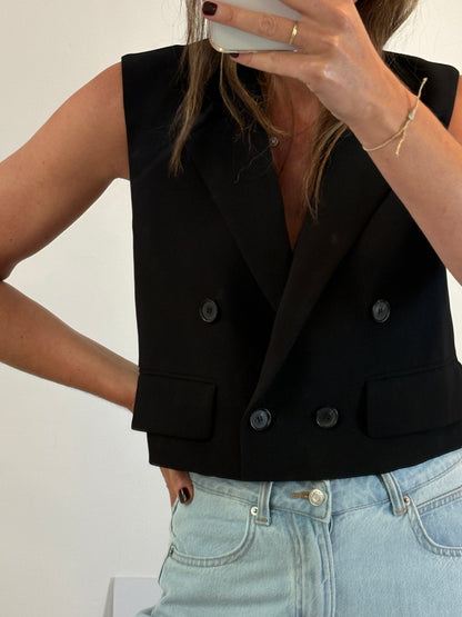 ZARA. Chaleco negro cruzado. T XS