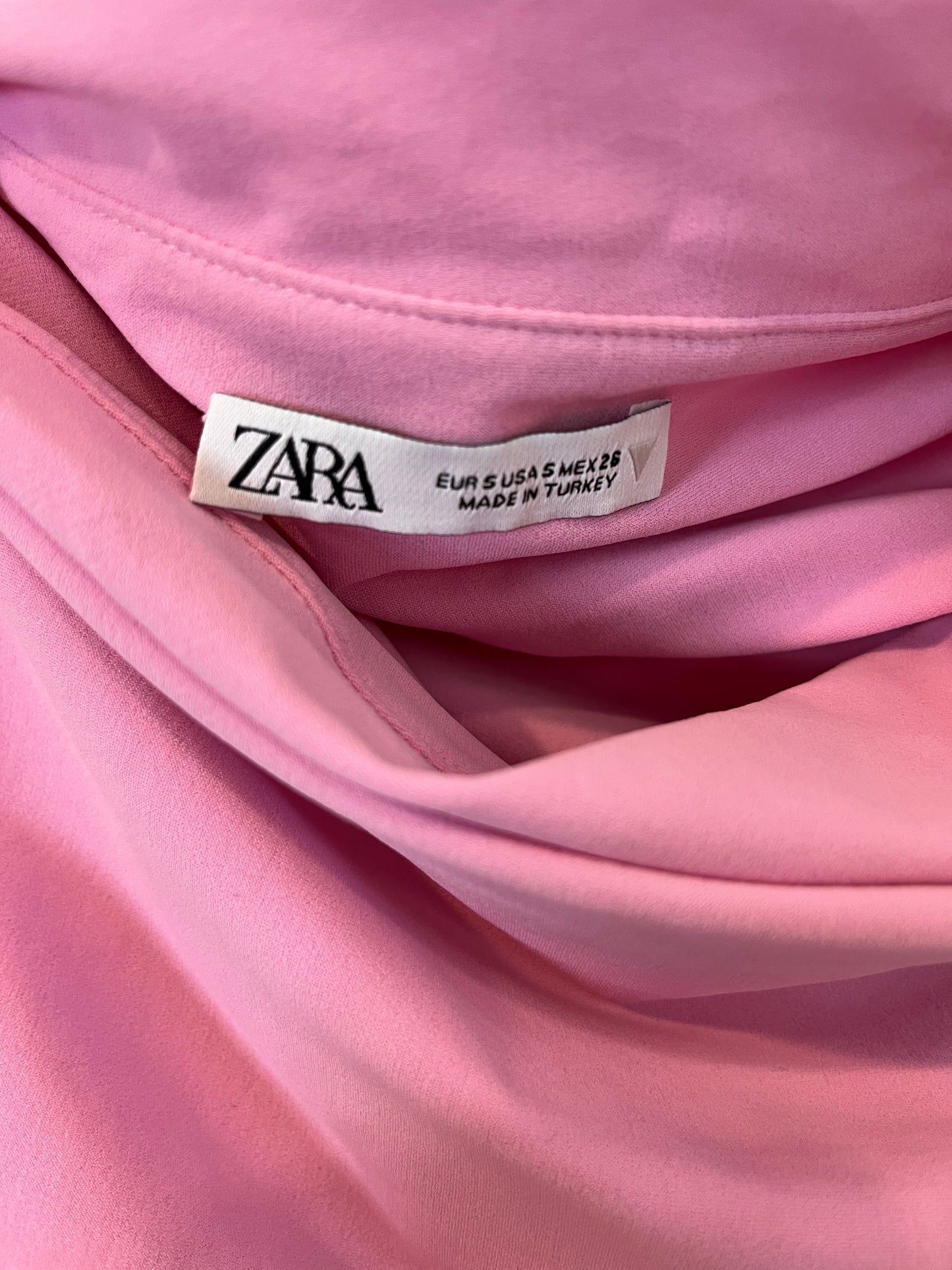 ZARA. Top rosa escote asimétrico T.s