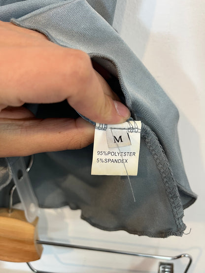 OTRAS. Total look top y falda detalle flor T.m