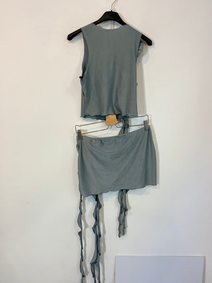 OTRAS. Total look top y falda detalle flor T.m