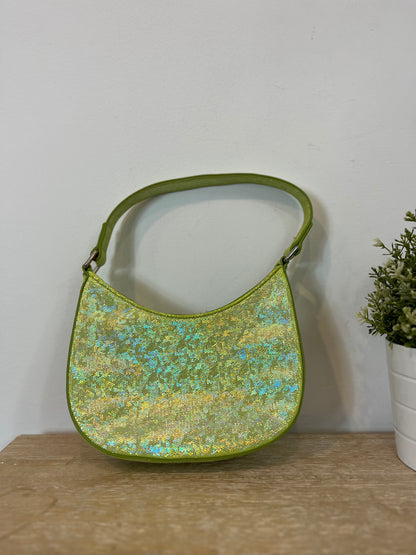 OTRAS. Bolso verde brillos