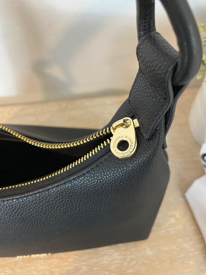 SIMORRA. Black leather bag