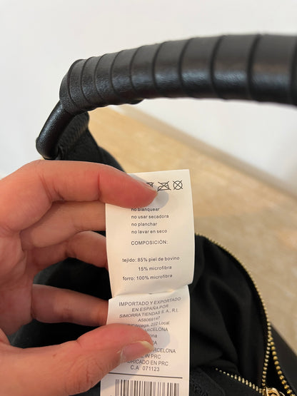 SIMORRA. Black leather bag