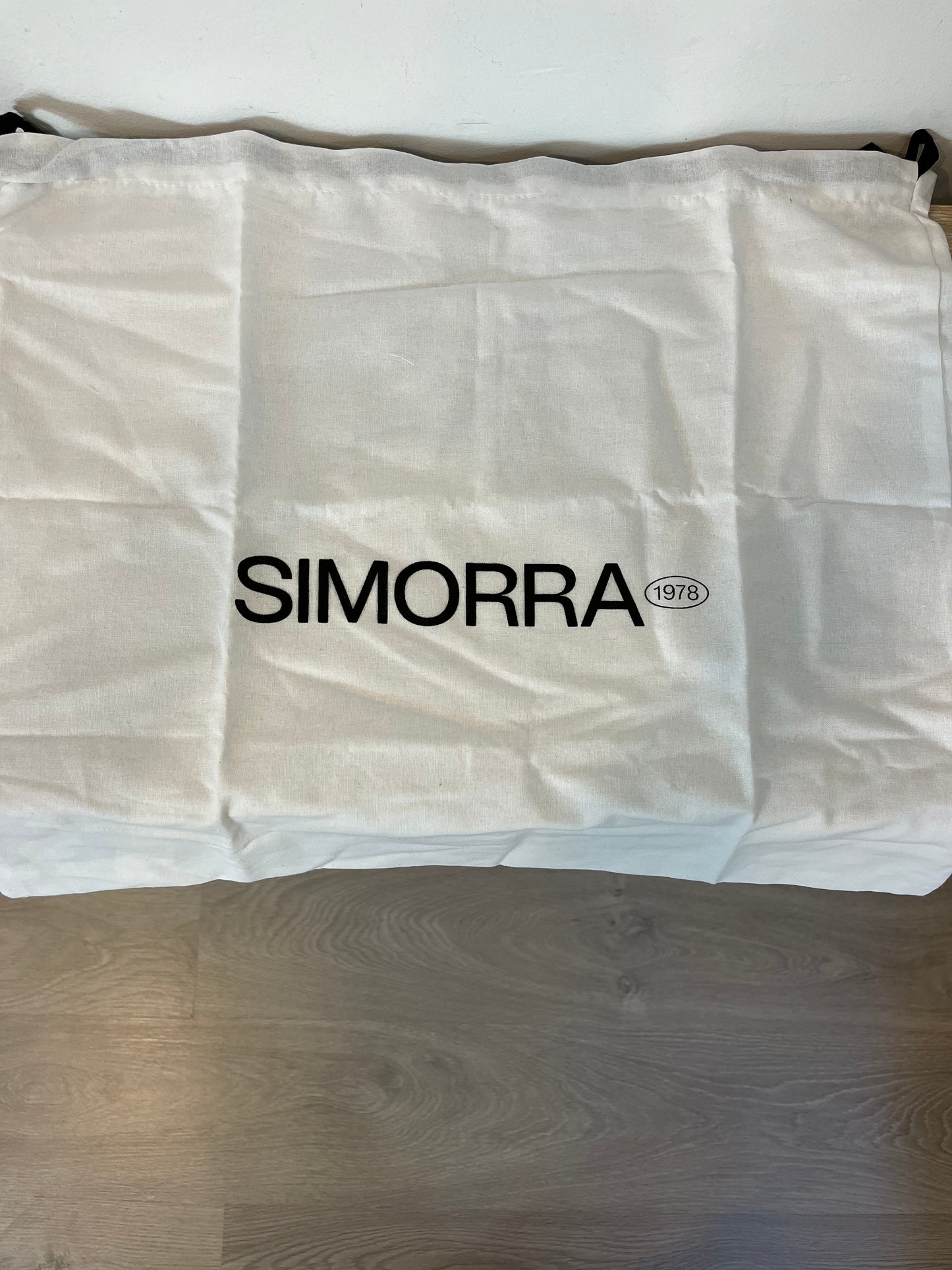 SIMORRA. Black leather bag
