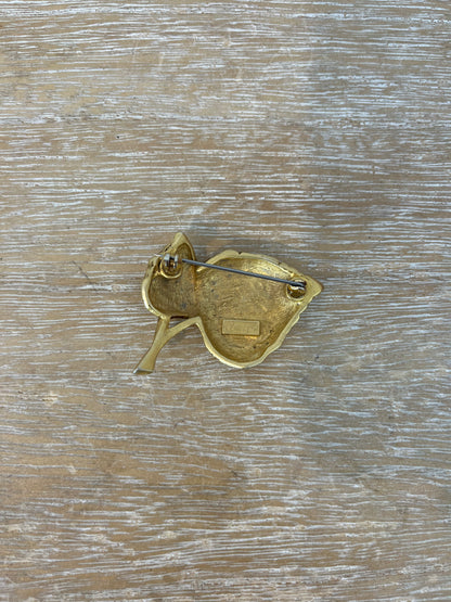 OTRAS. Broche dorados hojas