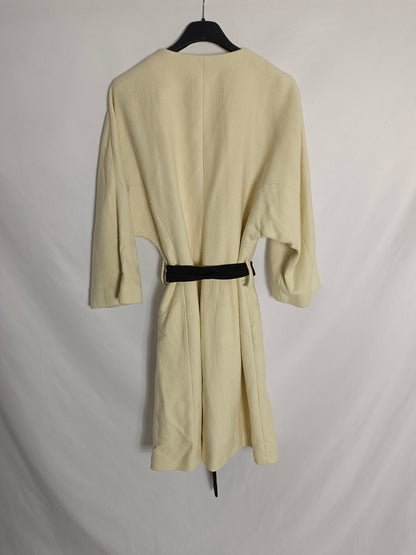 ZARA. Beige coat with black bow Tm