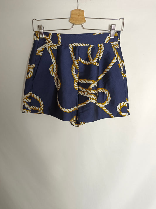 ZARA. Shorts azul nudos T.xs