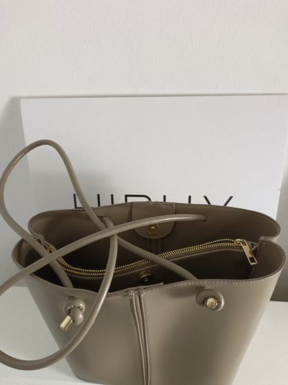 ZARA. Bolso beige polipiel