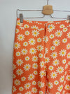 PEPITAS. Pantalón naranja flores T.m