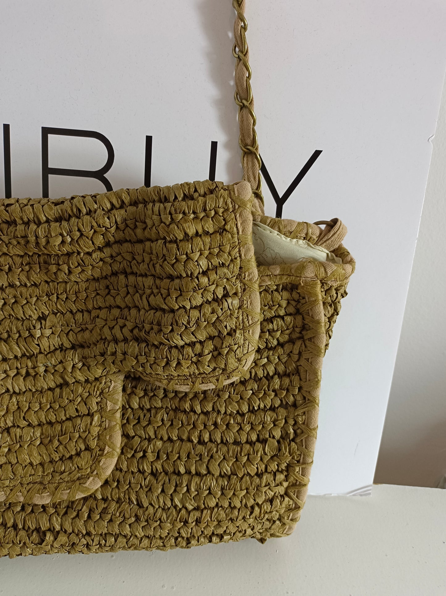 NICE THINGS. Bolso rafia verdoso