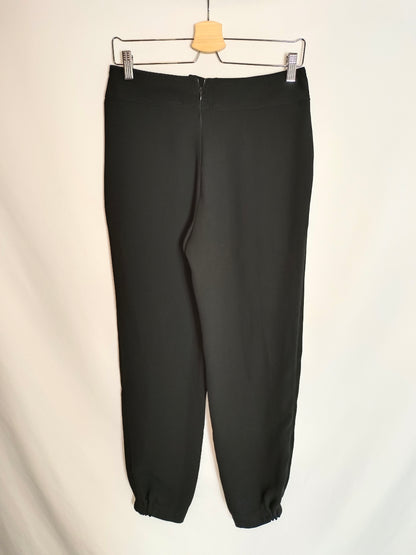 TRUCCO. Black pleated trousers, size 38