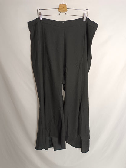 ASOS. Pantalón negro volante T.52