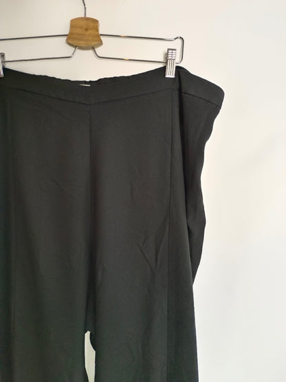 ASOS. Pantalón negro volante T.52