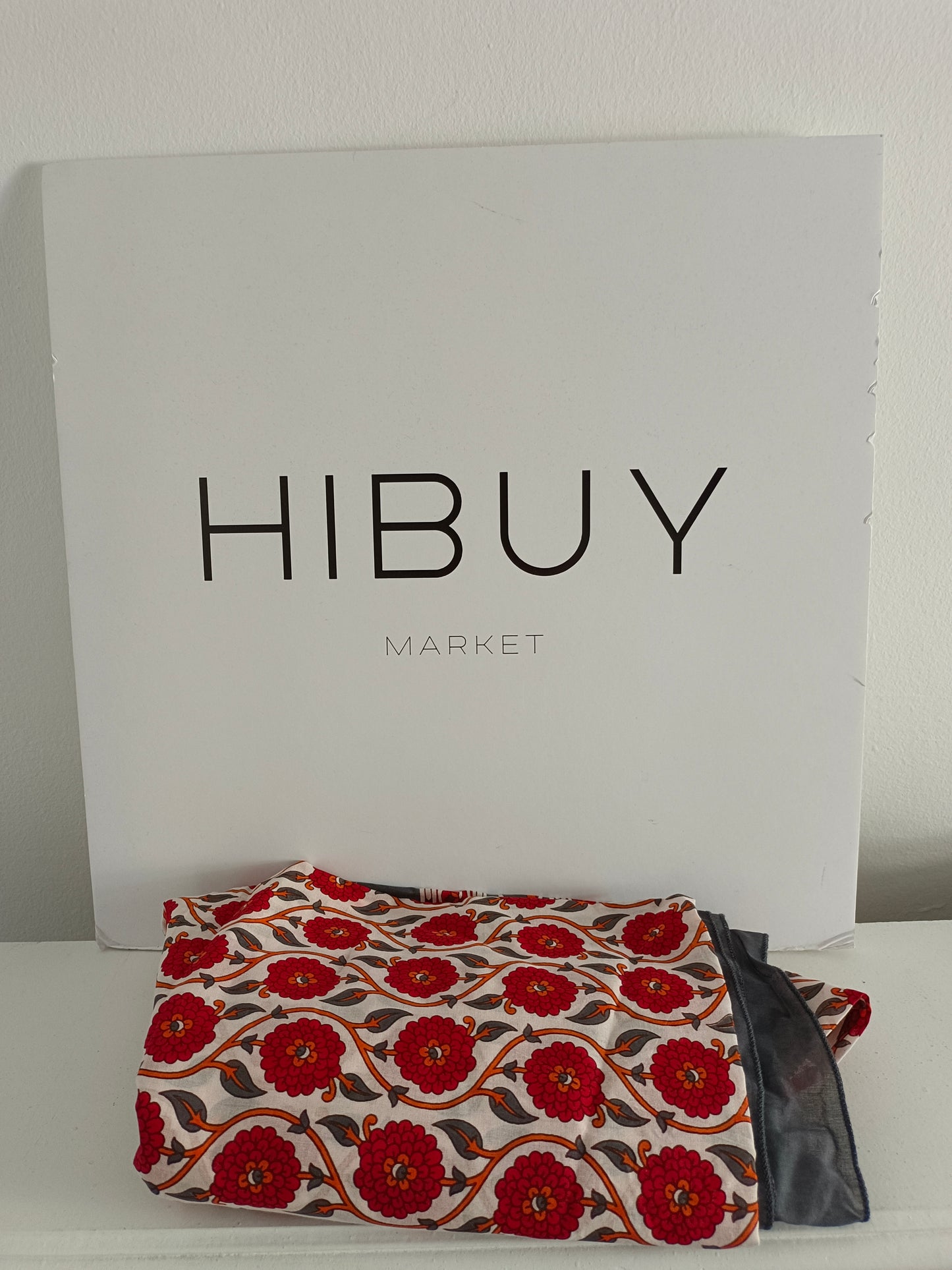 BOUGAINVILIA. White pareo with red flowers