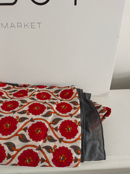 BOUGAINVILIA. White pareo with red flowers