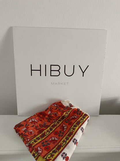 BOUGAINVILIA. White pareo with orange and yellow flowers