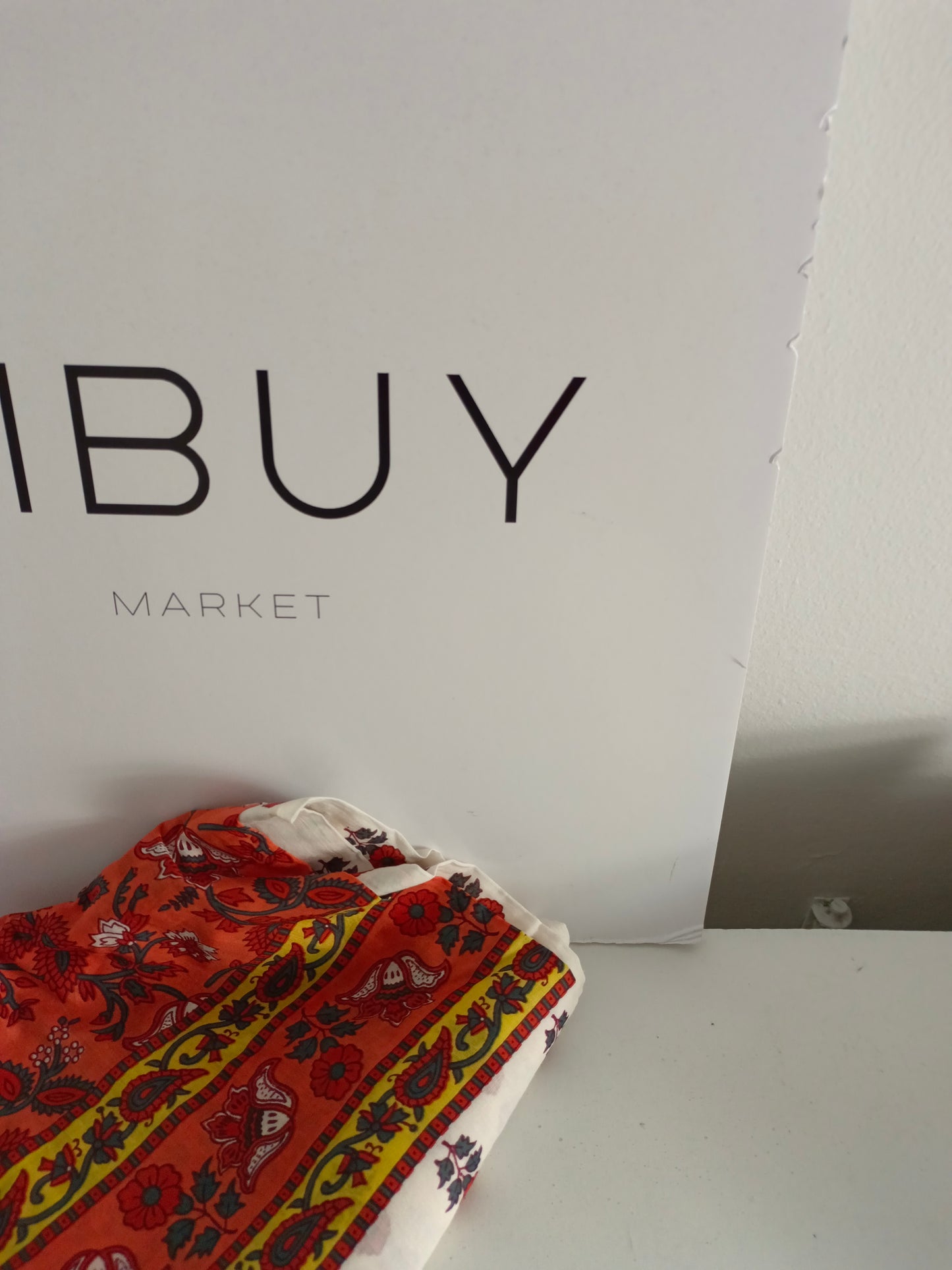 BOUGAINVILIA. White pareo with orange and yellow flowers