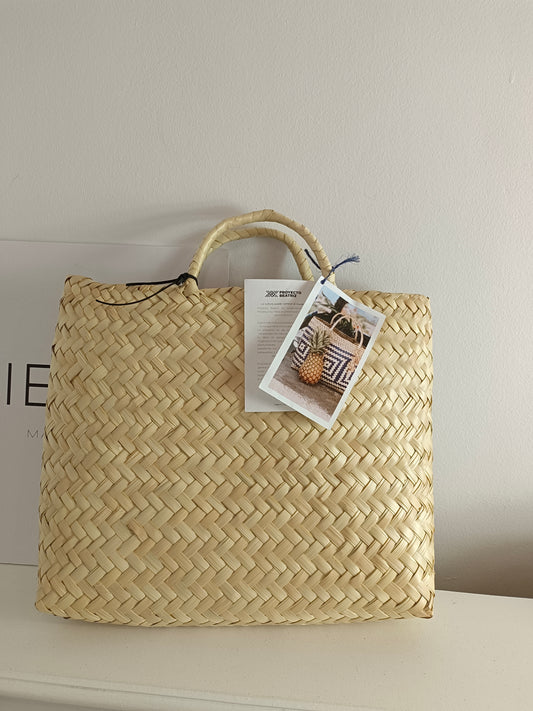 OTRAS. Bolso rafia rígido