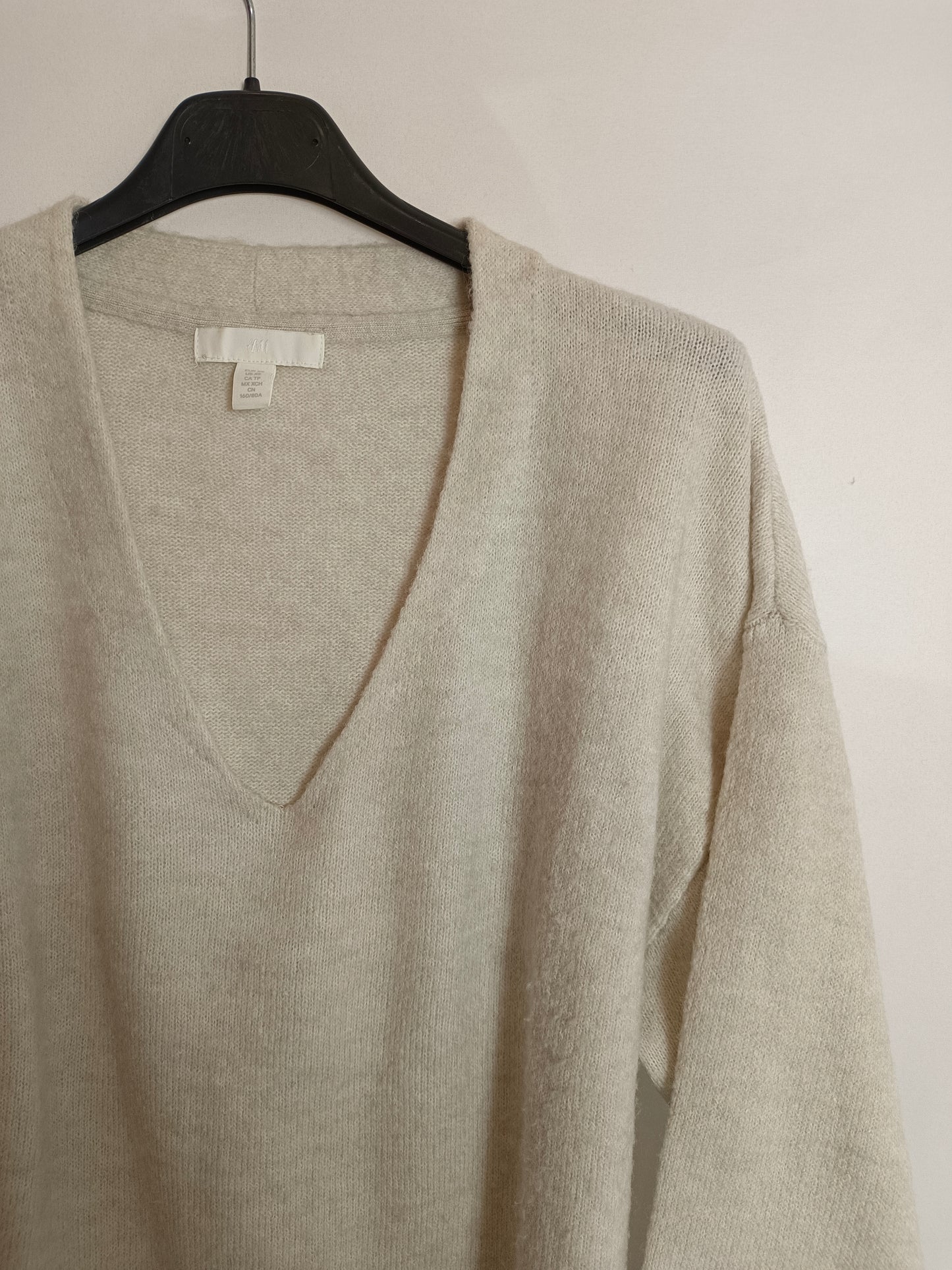 H&M. Jersey beige fluido T.xs