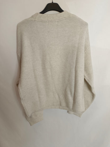 H&M. Jersey beige fluido T.xs