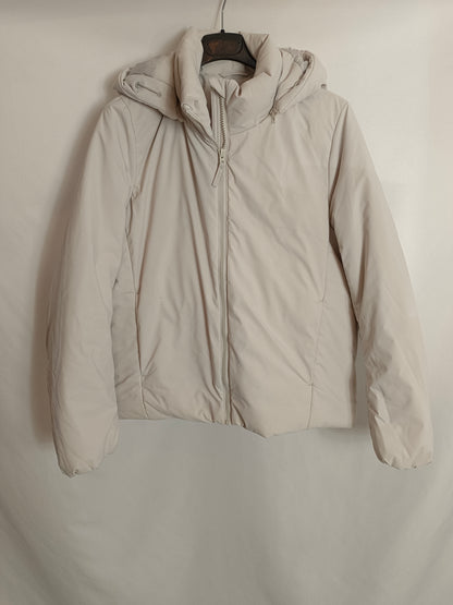 UNIQLO. Plumas beige capucha T.xs
