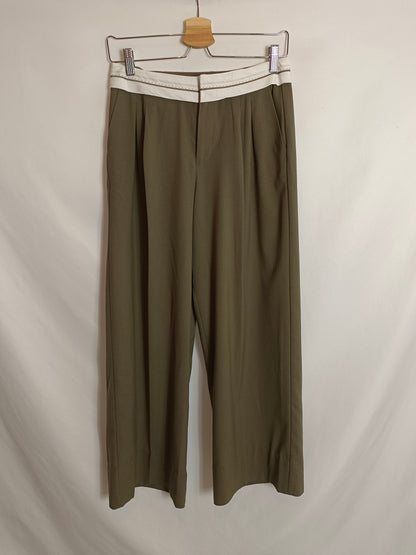 BERSHKA. Green pleated trousers, size 34