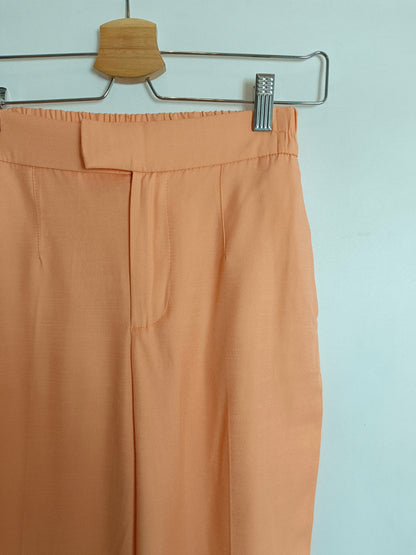 BERSHKA. pantalón naranja palo T.xs