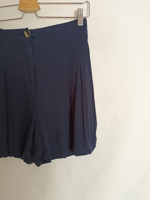 ZARA. shorts fluido azules T.s