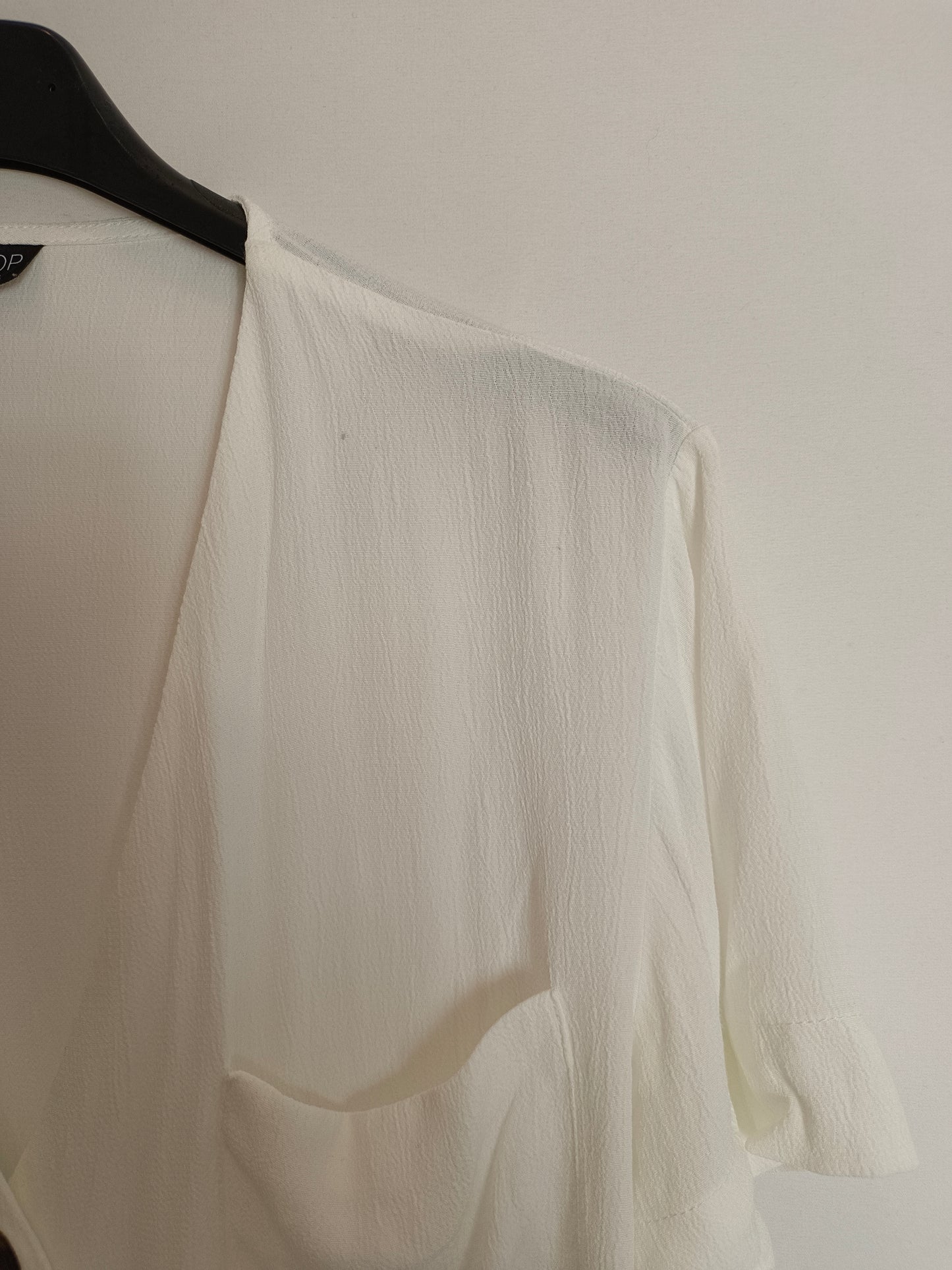 TOPSHOP. Blusa blanca botone T.34(tara)
