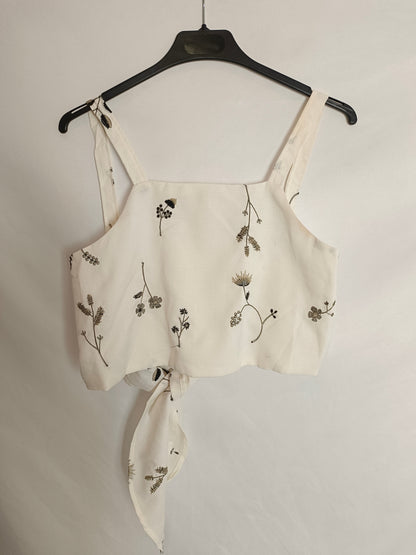 OTRAS. Croptop lazada y flores T.xs