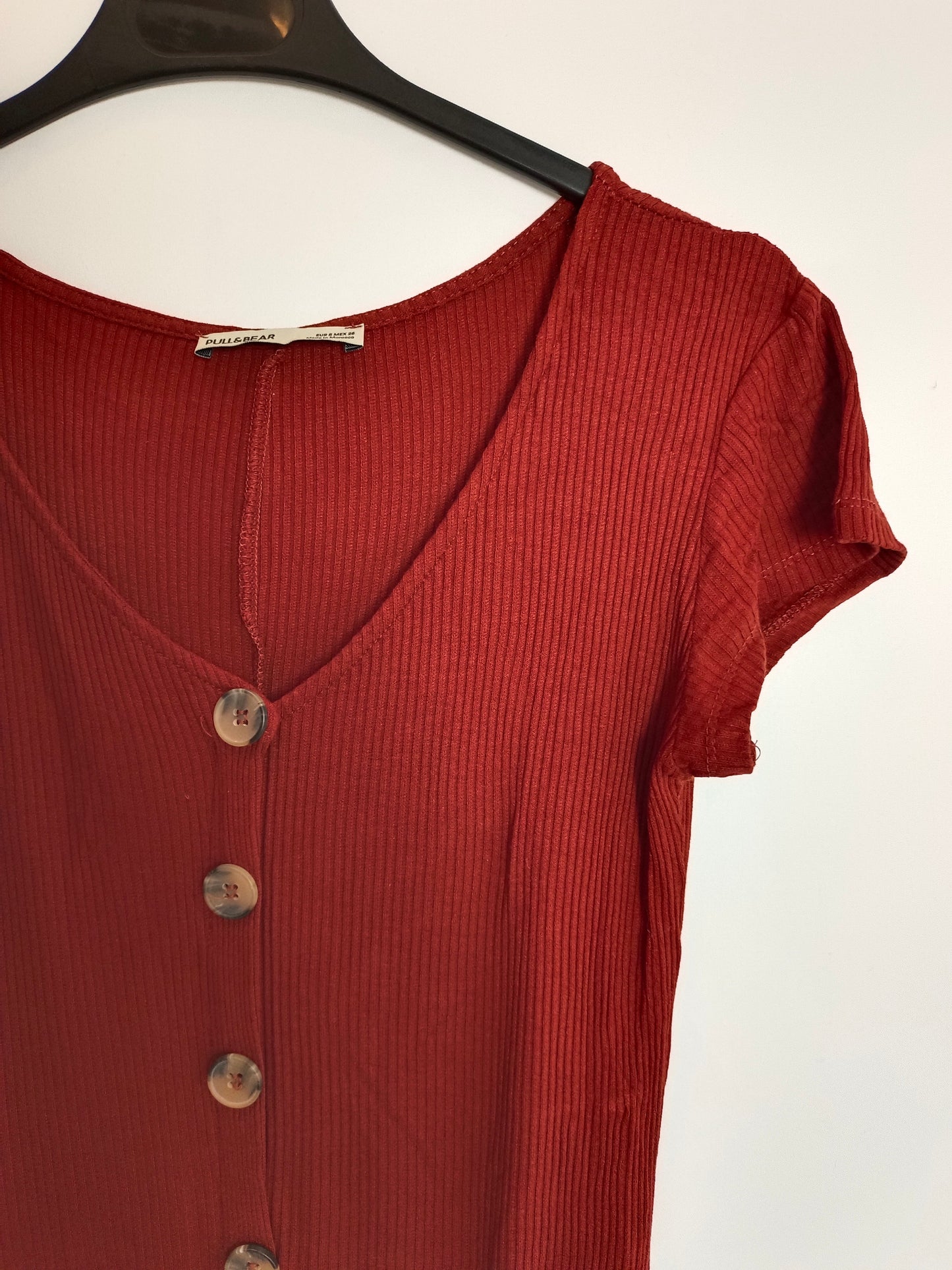 PULL&BEAR. Top teja largo botones. T.S