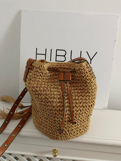 OTRAS. Bolso saco rafia