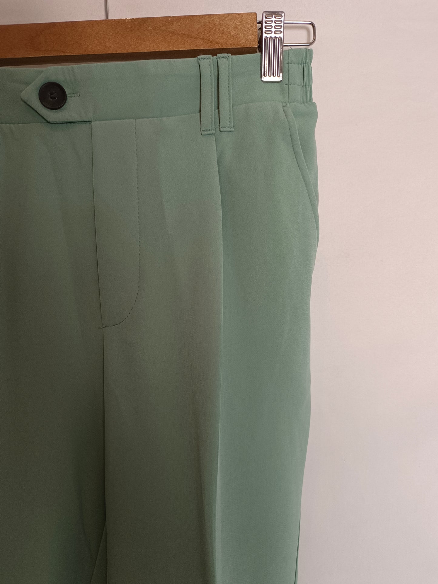 BERSHKA. Aqua green flowing trousers. TM