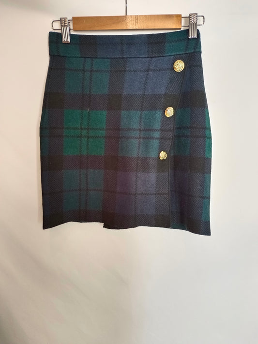 SFERA. Falda verde cuadros botones. T S
