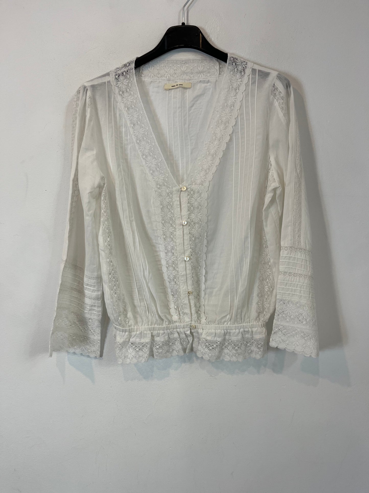 THAT ONE OR THAT ONE. White lace blouse. TS