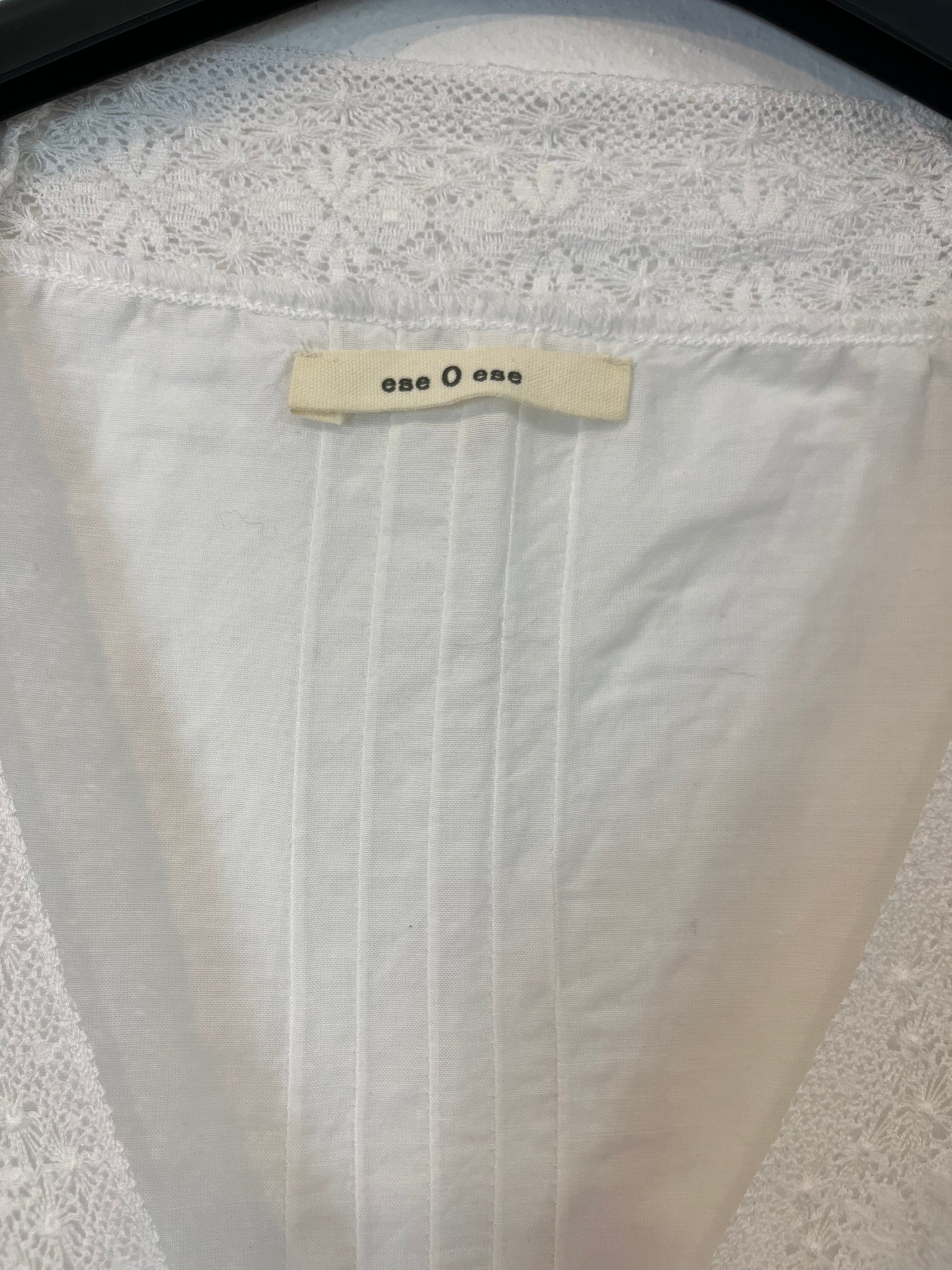 THAT ONE OR THAT ONE. White lace blouse. TS