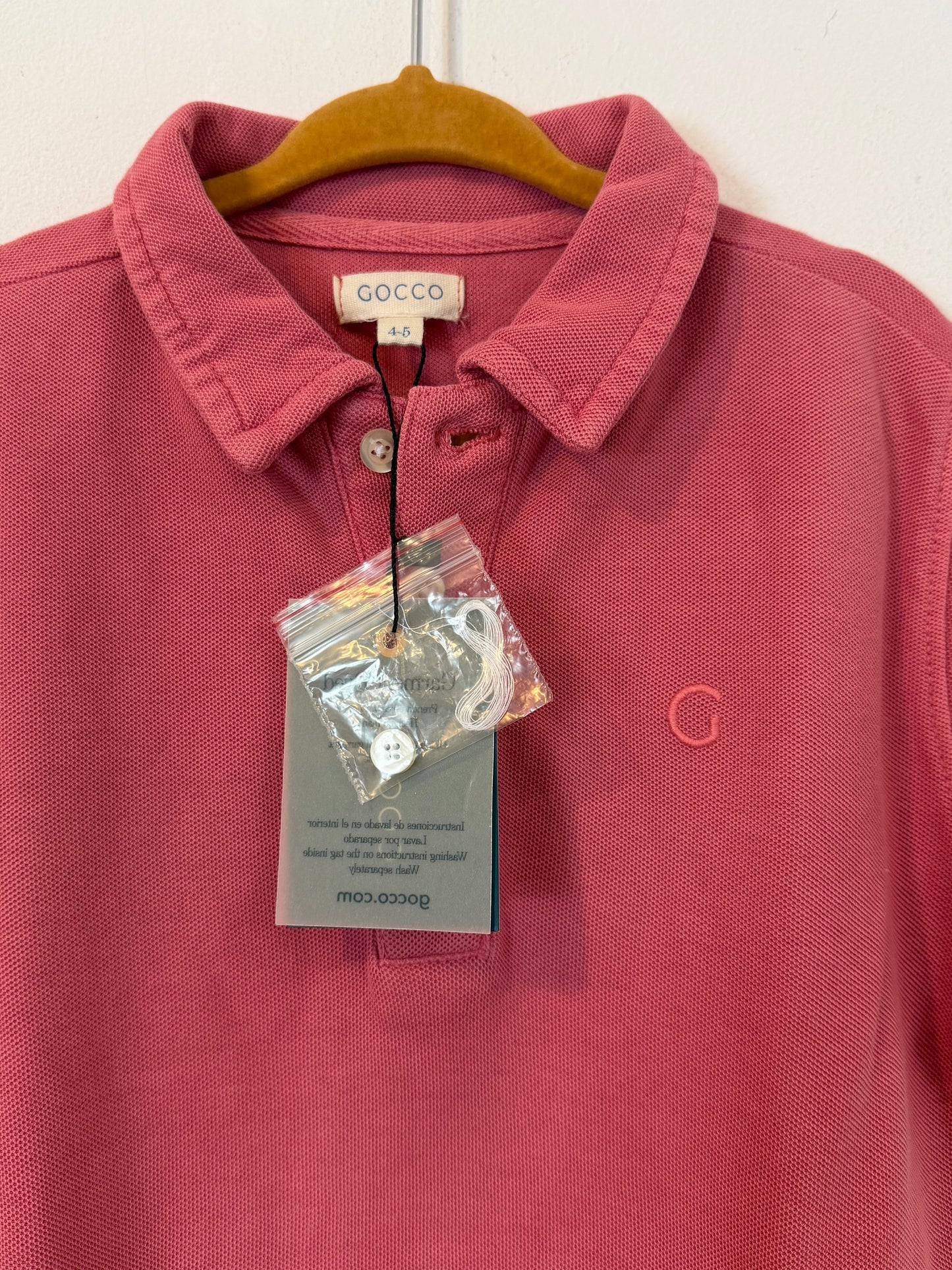 GOCCO. Polo rosa oscuro T.4-5 años
