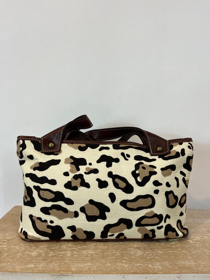 SYNTHESIS. Animal print bag with leather