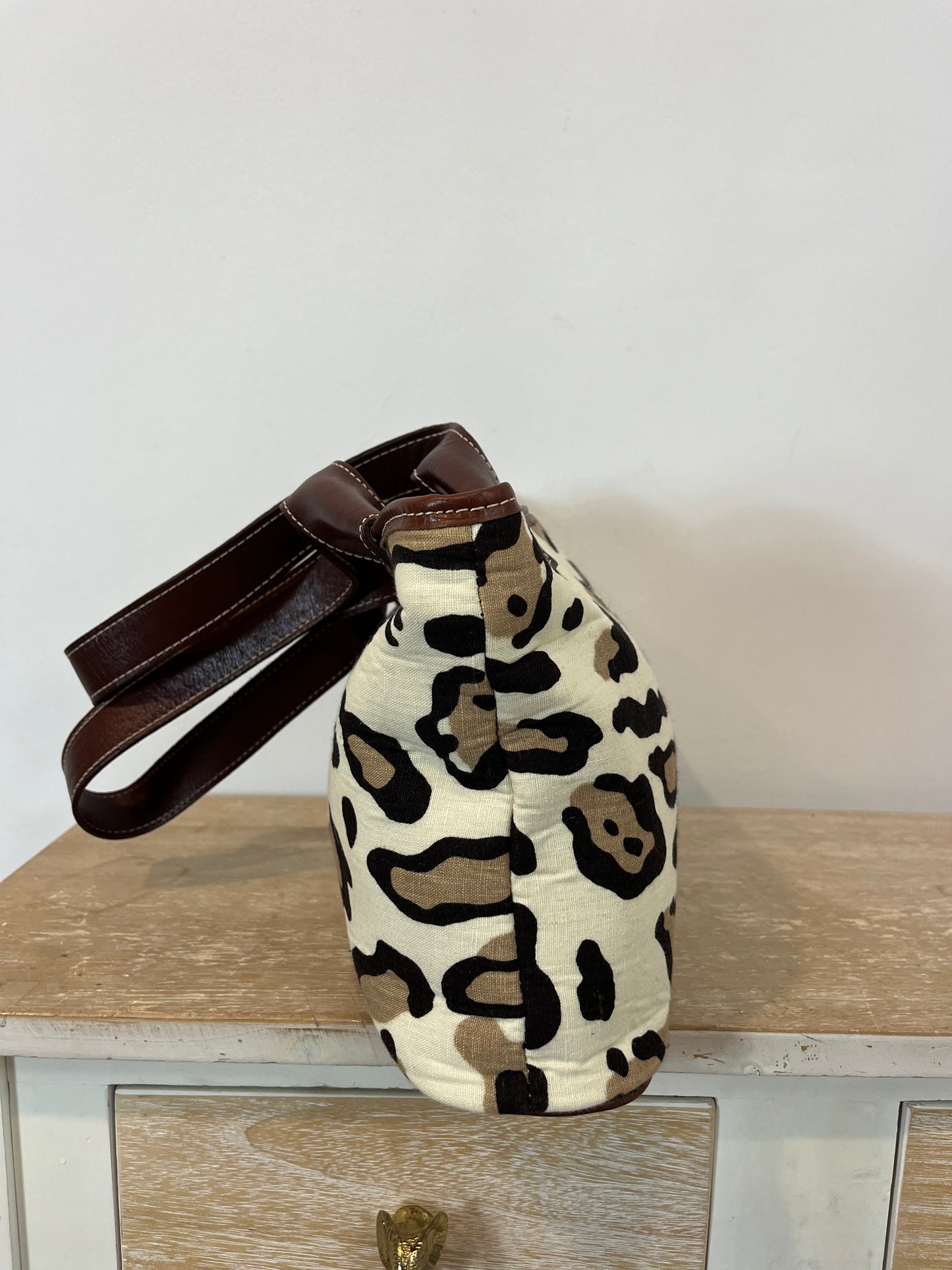 SYNTHESIS. Animal print bag with leather