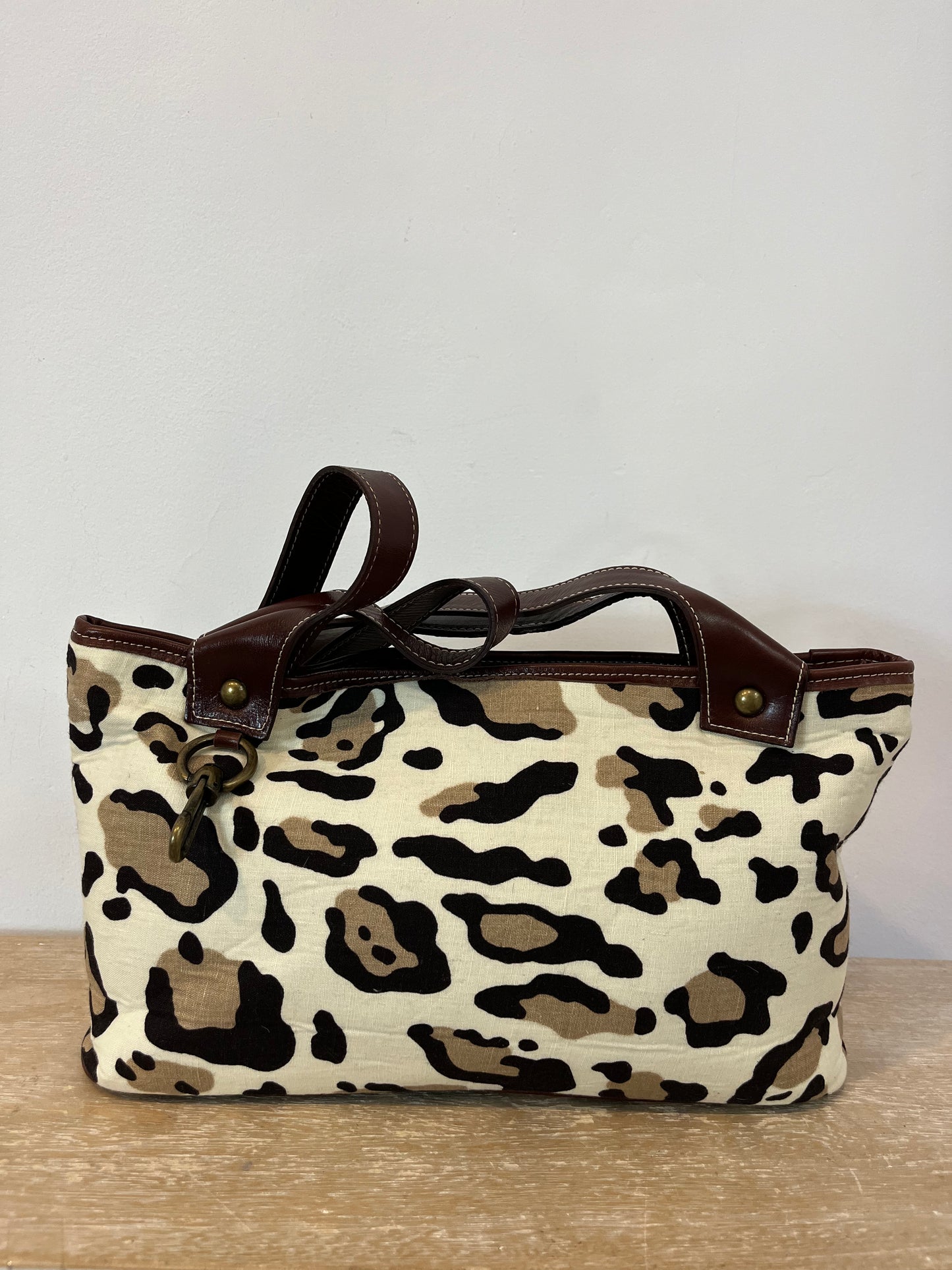 SYNTHESIS. Animal print bag with leather