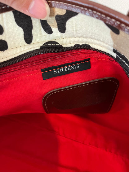 SYNTHESIS. Animal print bag with leather